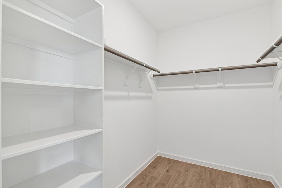 Large walk-in closet in the primary suite Large walk-in closet in the primary suite