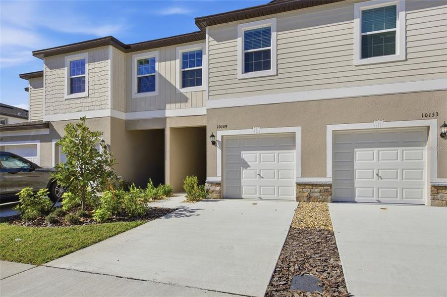 Front exterior of a new home in , San Antonio, FL, highlighting curb appeal (Image 19).