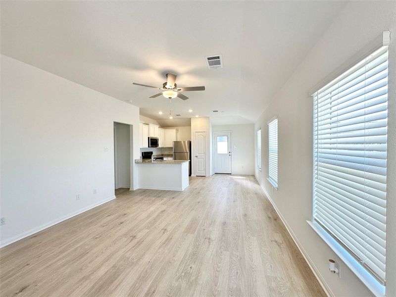 The kitchen overlooks the living room and dining area so that you never miss a beat as you prep your next meal.