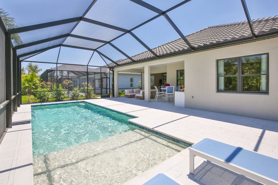 Exterior details and patio area of a home in Boca Royale Golf & Country Club at Wellen Park, Englewood (Image 24).