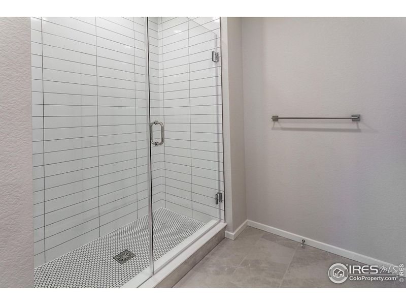 Primary Bathroom with Tiled Shower