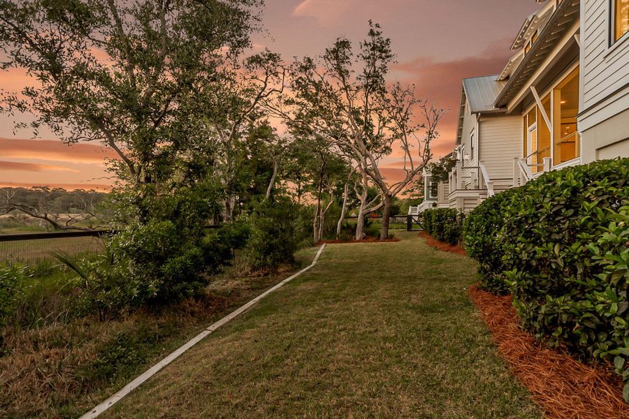 Exterior details and patio area of a home in Daniel Island Park, Charleston (Image 33).