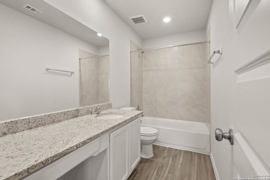 Furnished interior view inside a new home in Cinco Lakes, San Antonio (Image 8).