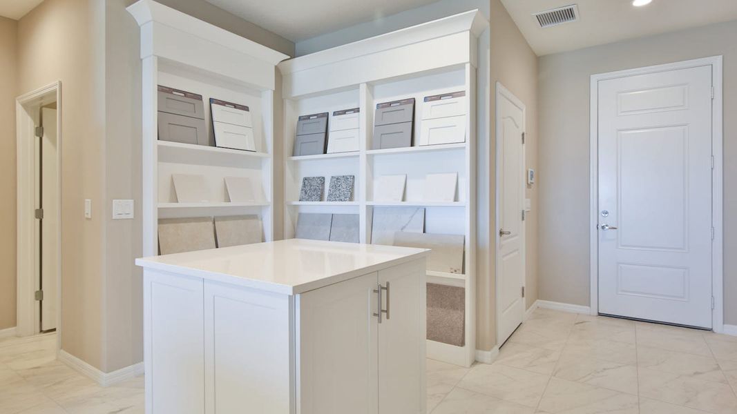 Furnished interior view inside a new home in Palm Grove Real Estate and Homes for Sale in Lakewood Ranch, FL - Neal Communities, Lakewood Ranch (Image 39).