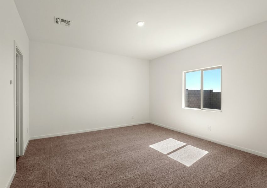 Secondary bedrooms hold all the space for guests to relax.