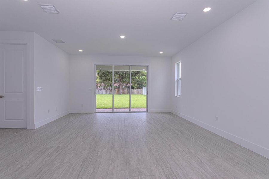 Spacious, unfurnished interior of a new home in , Jupiter (Image 11).