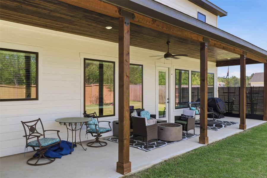 Exterior details and patio area of a home in Magnolia Woods - 70', Magnolia (Image 3).