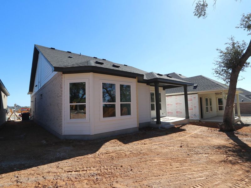 Exterior details and patio area of a home in Heritage, Dripping Springs (Image 3). Exterior details and patio area of a home in Heritage, Dripping Springs (Image 3).