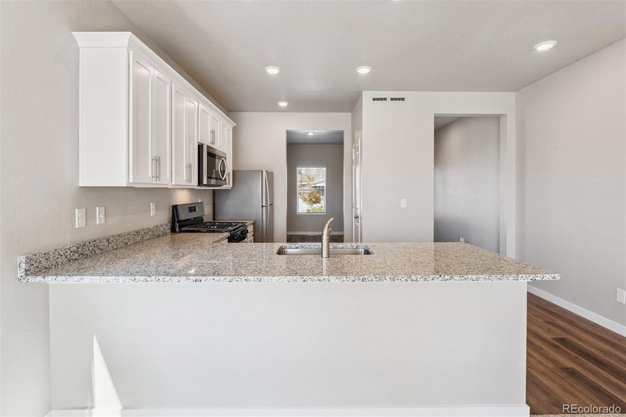 Furnished interior view inside a new home in Cottonwood Greens, Fort Lupton (Image 5).