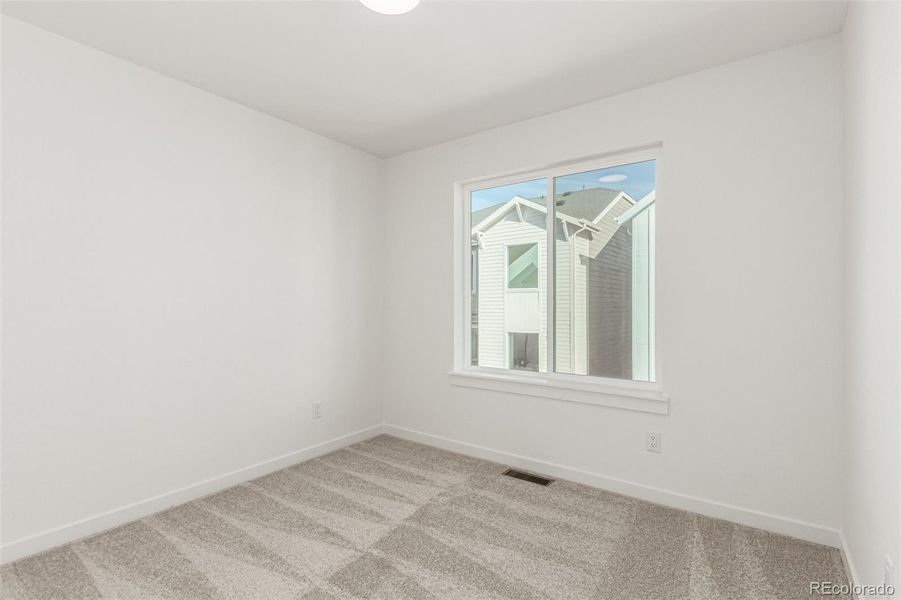 Spacious, unfurnished interior of a new home in Victory Ridge, Colorado Springs (Image 17).