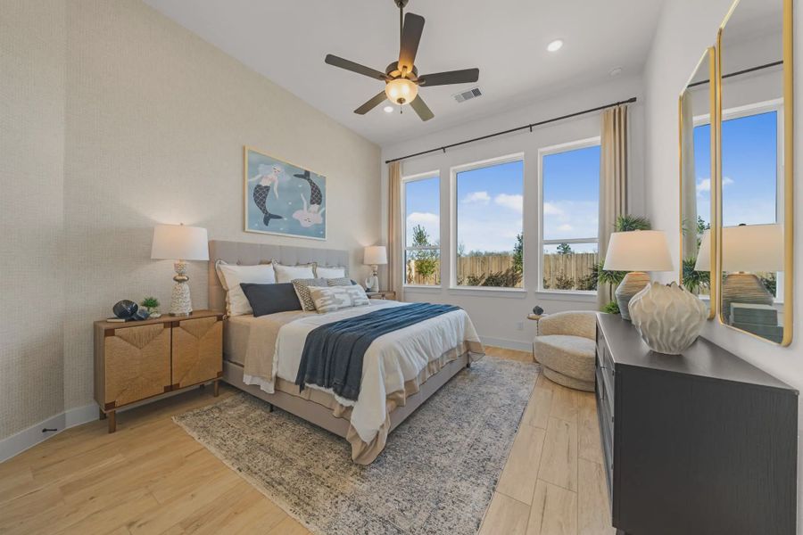Representative furnished interior of a home built from the Hampton by Chesmar Homes in Meridiana 50's and 60's, Manvel (Image 45).