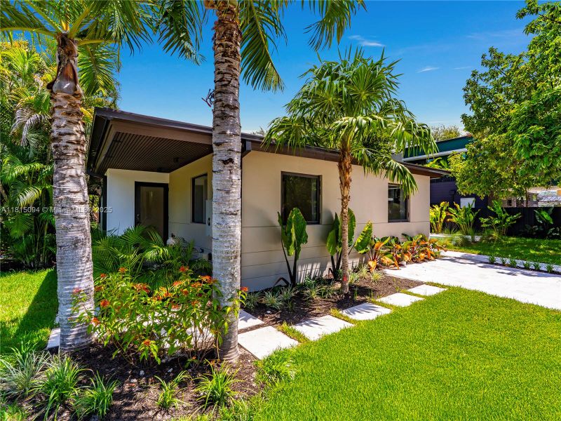 Front exterior of a new home in , Miami, FL, highlighting curb appeal (Image 30).