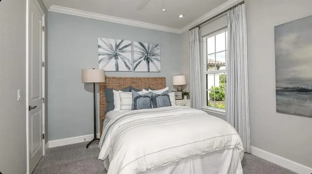 Furnished interior view inside a new home in Esplanade at Wellen Park, Englewood (Image 11).