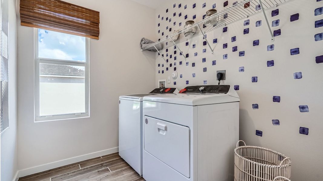 Representative furnished interior of a home built from the Grandcourt by D.R. Horton in Parker Pointe, Homestead (Image 30).