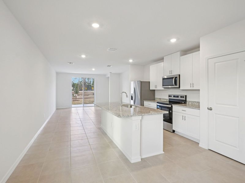 Furnished interior view inside a new home in Salt Meadows - Premier Series, Parrish (Image 4).