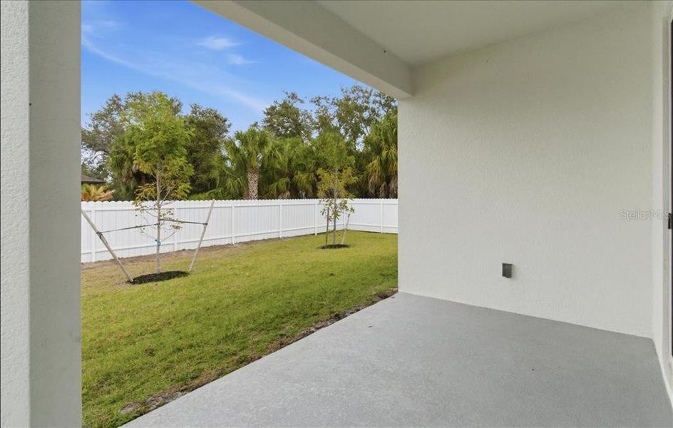Exterior details and patio area of a home in , North Port (Image 36).