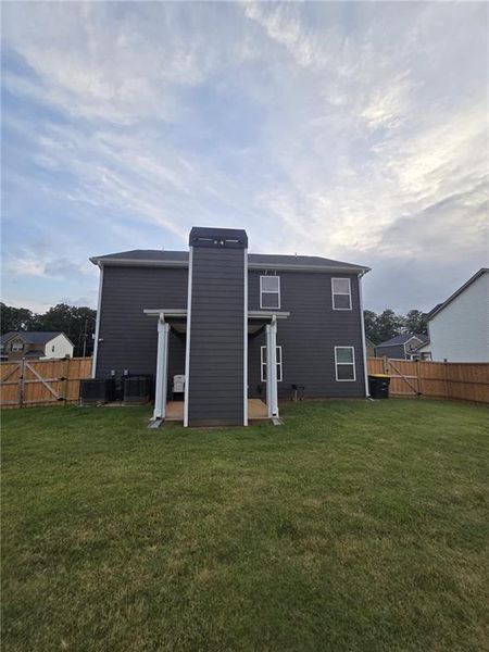 Exterior details and patio area of a home in Fern Dale, Fairburn (Image 4).