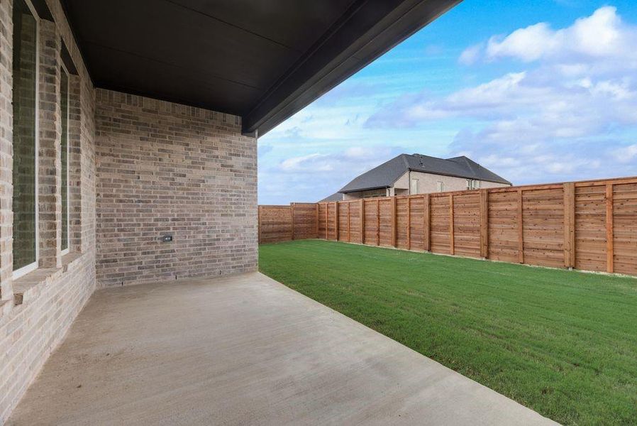 Exterior details and patio area of a home in Solterra Texas, Mesquite (Image 25).