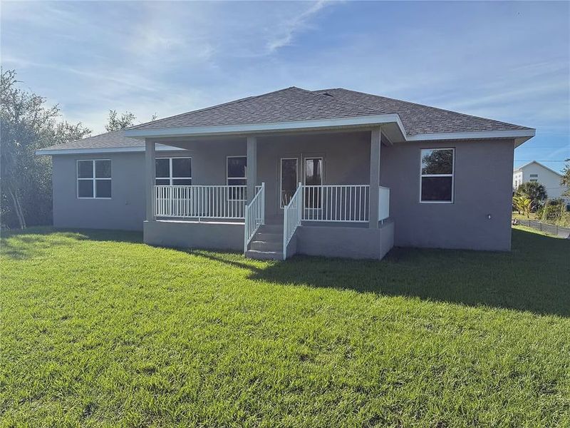 Exterior details and patio area of a home in South Gulf Cove, Port Charlotte (Image 3).