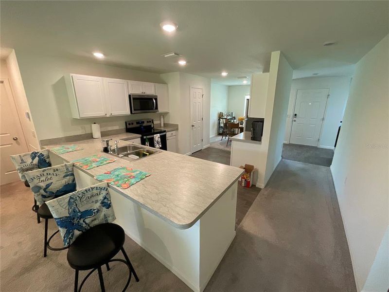 Furnished interior view inside a new home in , Port Charlotte (Image 35).