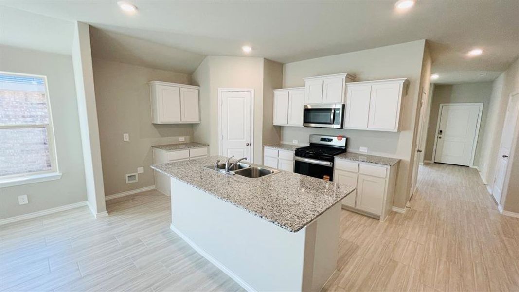 Kitchen - All Home and community information, including pricing, included features, terms, availability and amenities, are subject to change at any time without notice or obligation. All Drawings, pictures, photographs, video, square footages, floor plans, elevations, features, colors and sizes are approximate for illustration purposes only and will vary from the homes as built. Kitchen - All Home and community information, including pricing, included features, terms, availability and amenities, are subject to change at any time without notice or obligation. All Drawings, pictures, photographs, video, square footages, floor plans, elevations, features, colors and sizes are approximate for illustration purposes only and will vary from the homes as built.