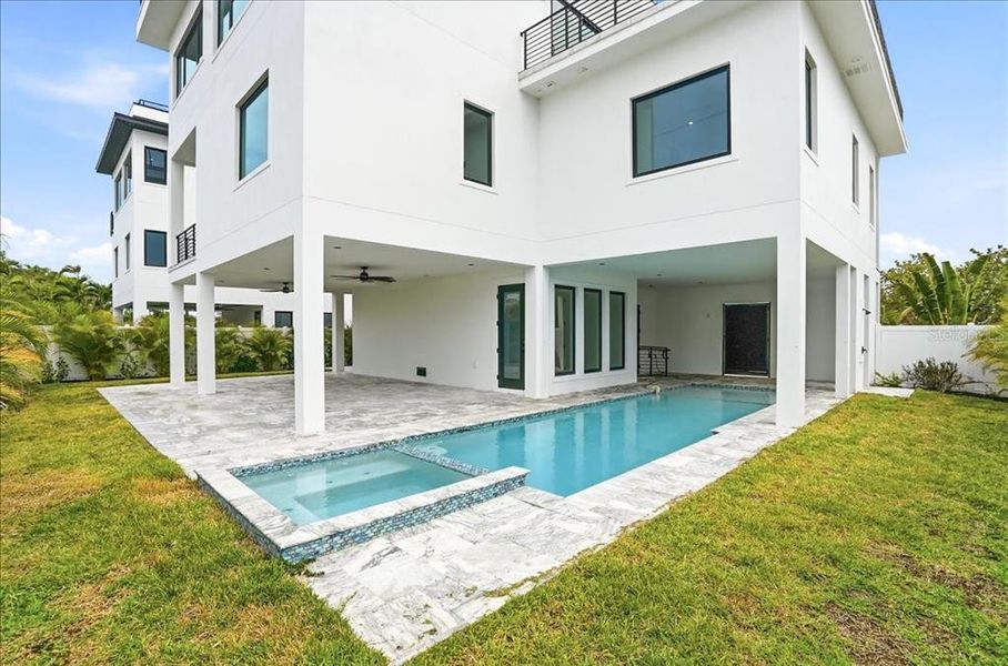 Exterior details and patio area of a home in , Englewood (Image 31).