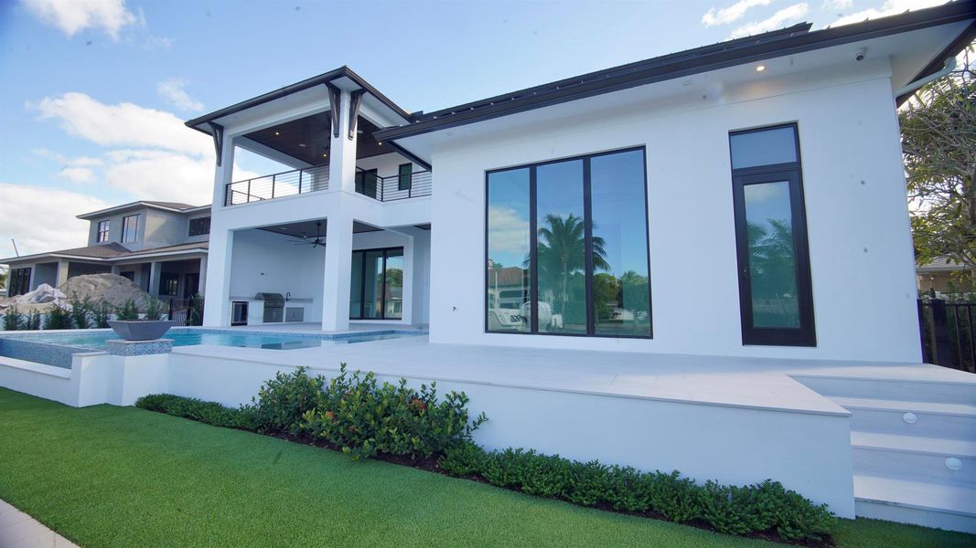 Exterior details and patio area of a home in , Palm Beach Gardens (Image 33).