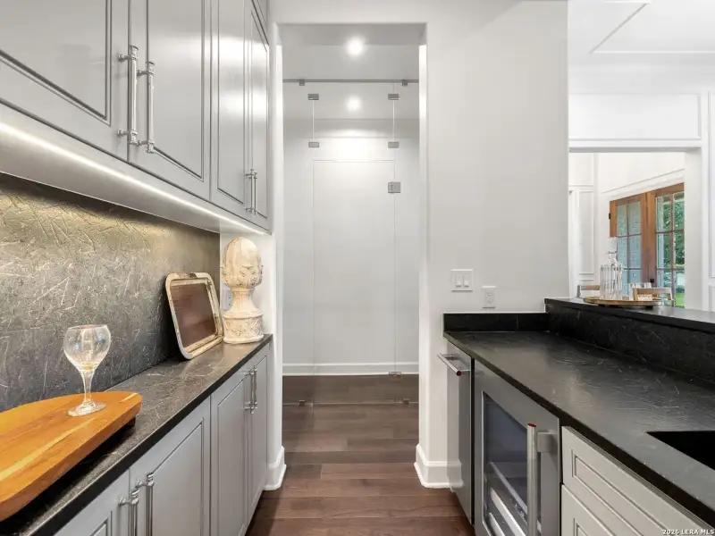 Furnished interior view inside a new home in , Alamo Heights (Image 32).