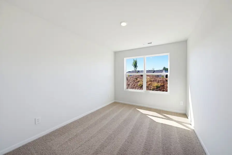 Spacious, unfurnished interior of a new home in Sweetbrier, Durham (Image 22).