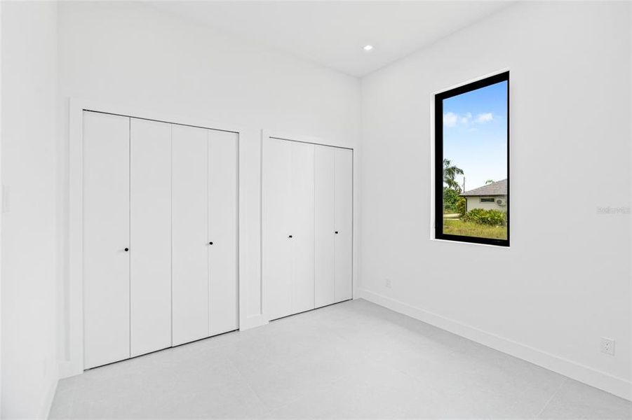 Spacious, unfurnished interior of a new home in , Port Charlotte (Image 62).