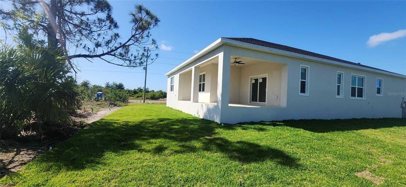 Exterior details and patio area of a home in , Port Charlotte (Image 3).