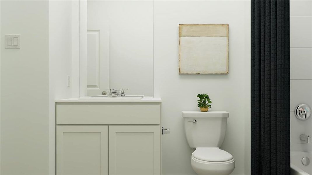 Bathroom with vanity and toilet