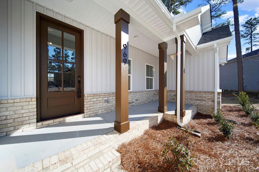 Exterior details and patio area of a home in , Oakboro (Image 20).