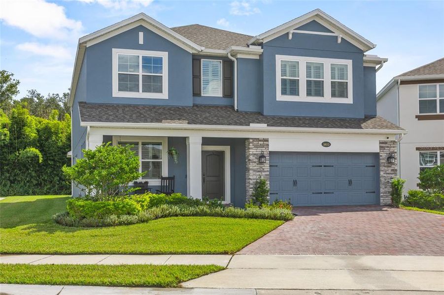 Front exterior of a new home in , Sanford, FL, highlighting curb appeal (Image 2).