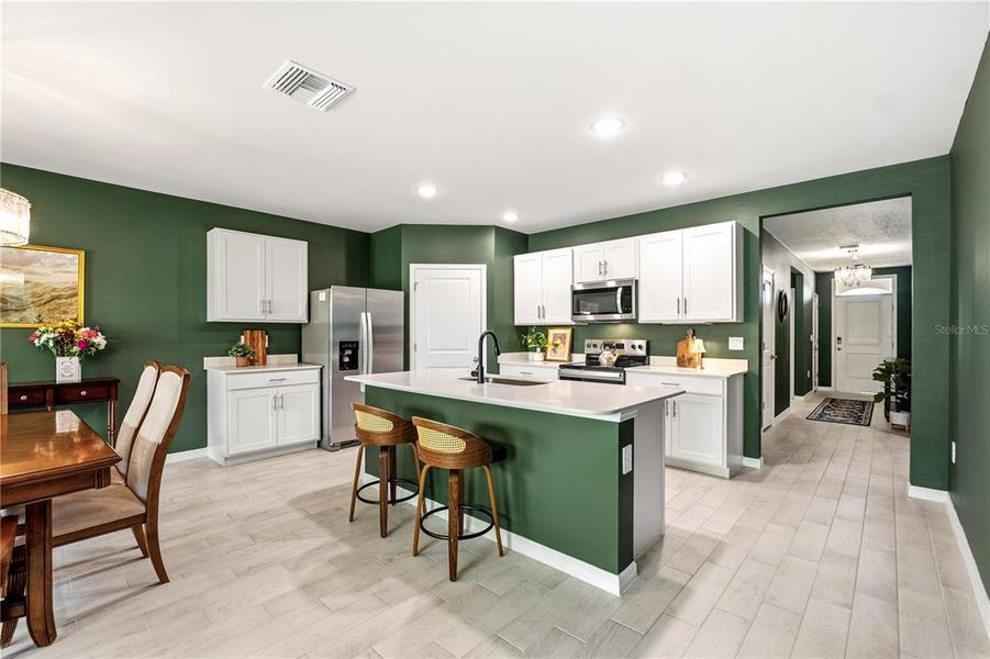 Furnished interior view inside a new home in Burnt Store Village, Punta Gorda (Image 7).