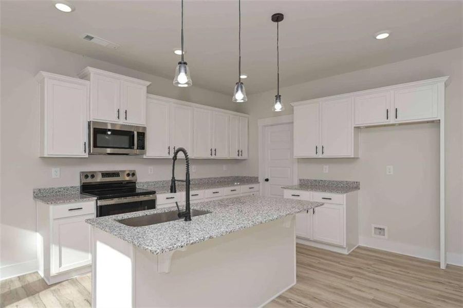 Furnished interior view inside a new home in , Buchanan (Image 10).