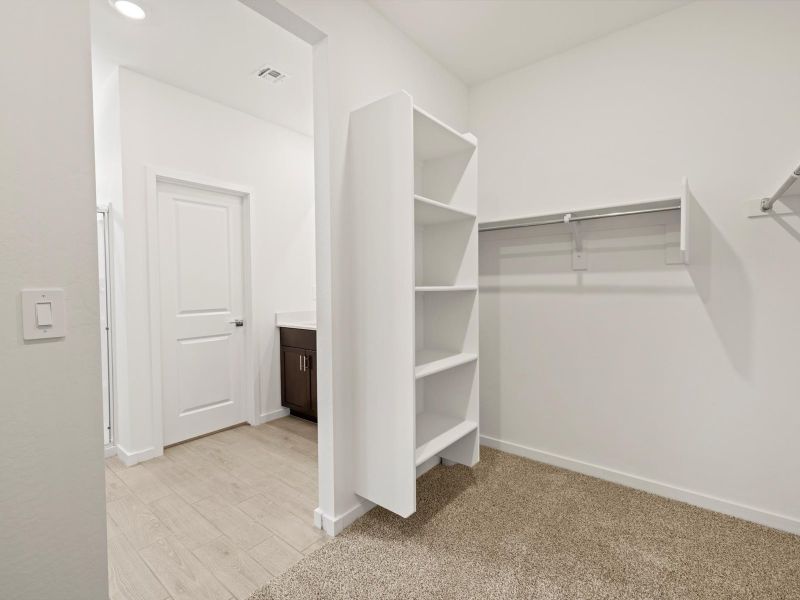Spacious, unfurnished interior of a new home in Rancho Mirage Estate Series, Maricopa (Image 11).