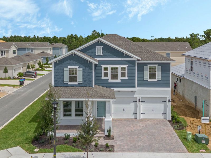 Representative exterior photo of a completed home built from the Faulkner by Rockwell Homes in Northlake at Ovation, Winter Garden, FL (Image 32). Representative exterior photo of a completed home built from the Faulkner by Rockwell Homes in Northlake at Ovation, Winter Garden, FL (Image 32).