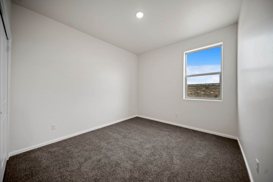Representative unfurnished interior of a home built from the Aguirre by Hakes Brothers in Summer Sky North, El Paso (Image 18).
