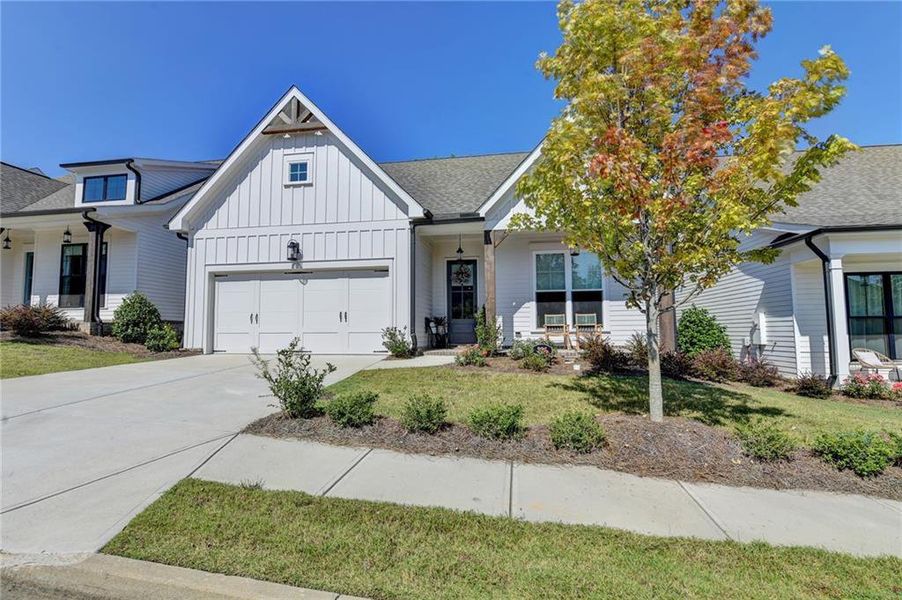 Front exterior of a new home in , Canton, GA, highlighting curb appeal (Image 26).