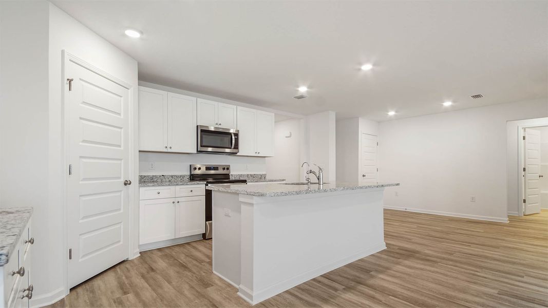Furnished interior view inside a new home in Sunny Hills, Chipley (Image 5).