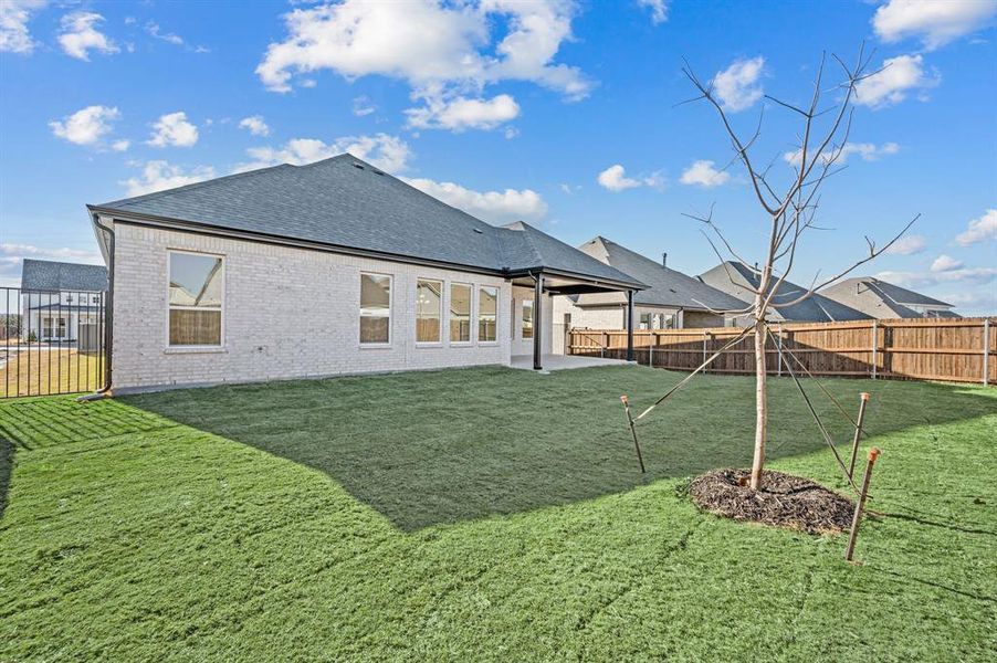Exterior details and patio area of a home in Parks of Aledo, Aledo (Image 27).