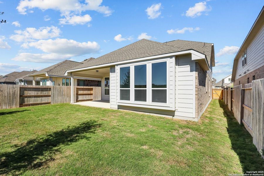 Exterior details and patio area of a home in Stillwater Ranch 45', San Antonio (Image 19). Exterior details and patio area of a home in Stillwater Ranch 45', San Antonio (Image 19).