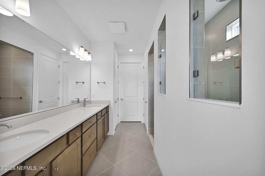 Furnished interior view inside a new home in Summer Bay at Grand Oaks, St. Augustine (Image 9).