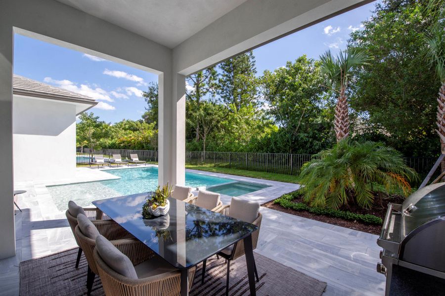 Exterior details and patio area of a home in Symphony at Jupiter, Jupiter (Image 23).