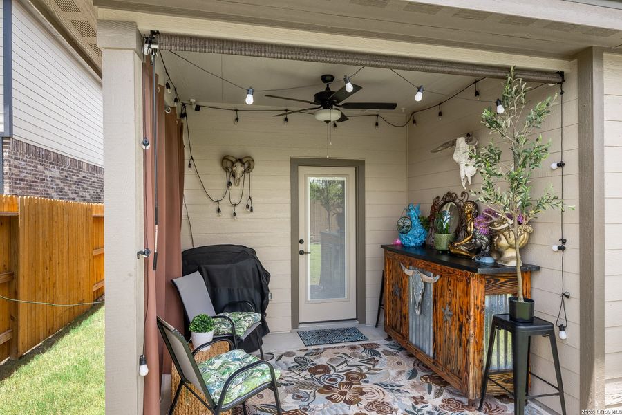 Exterior details and patio area of a home in Hightop Ridge, Converse (Image 3).