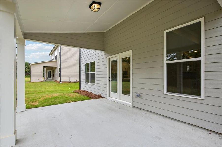 Exterior details and patio area of a home in Rosewood Lake Estates, Hoschton (Image 29).