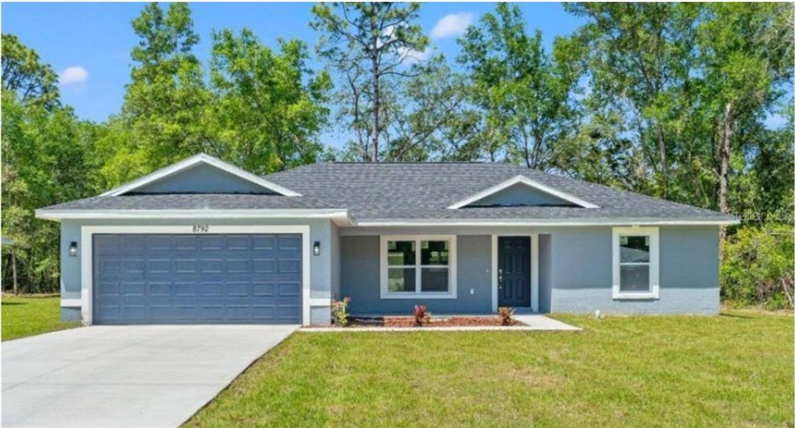 Front exterior of a new home in , Ocklawaha, FL, highlighting curb appeal (Image 1). Front exterior of a new home in , Ocklawaha, FL, highlighting curb appeal (Image 1).