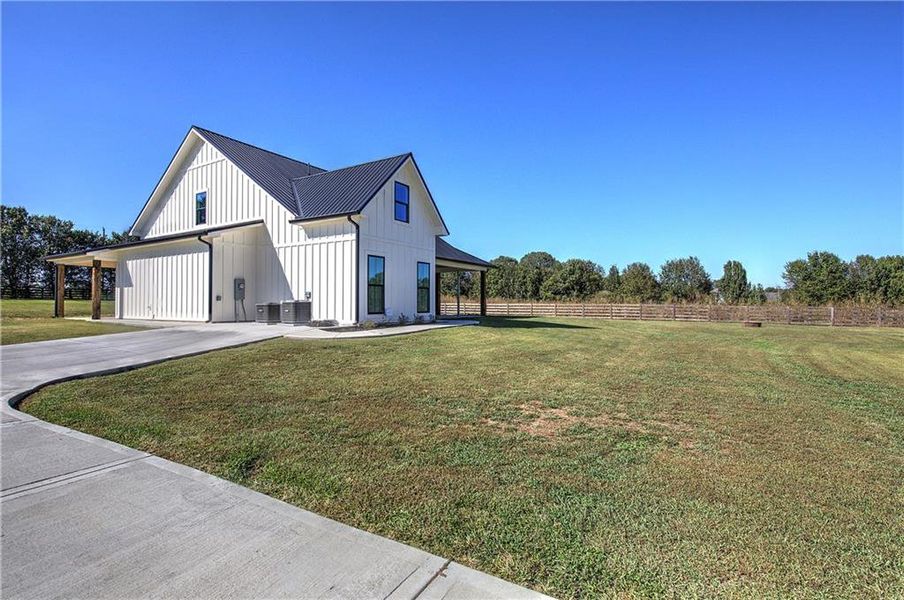 Front exterior of a new home in , Calhoun, GA, highlighting curb appeal (Image 26).