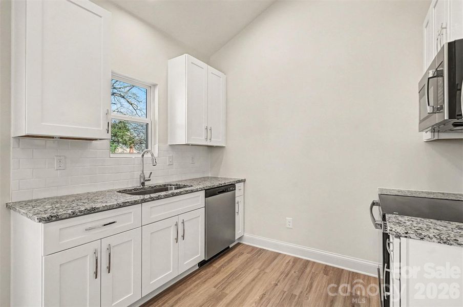 Furnished interior view inside a new home in , Monroe (Image 6).